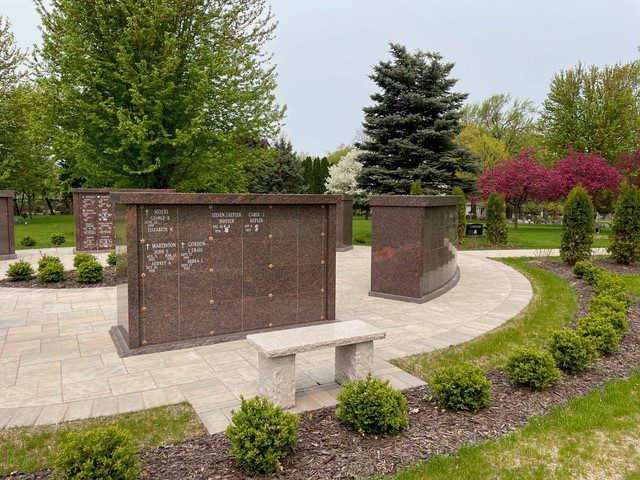Woodlawn Columbarium with a stone bench- Coldspring